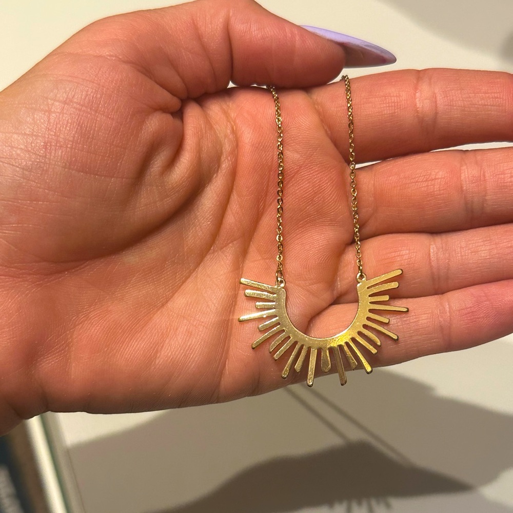 Gold tone Sun necklace